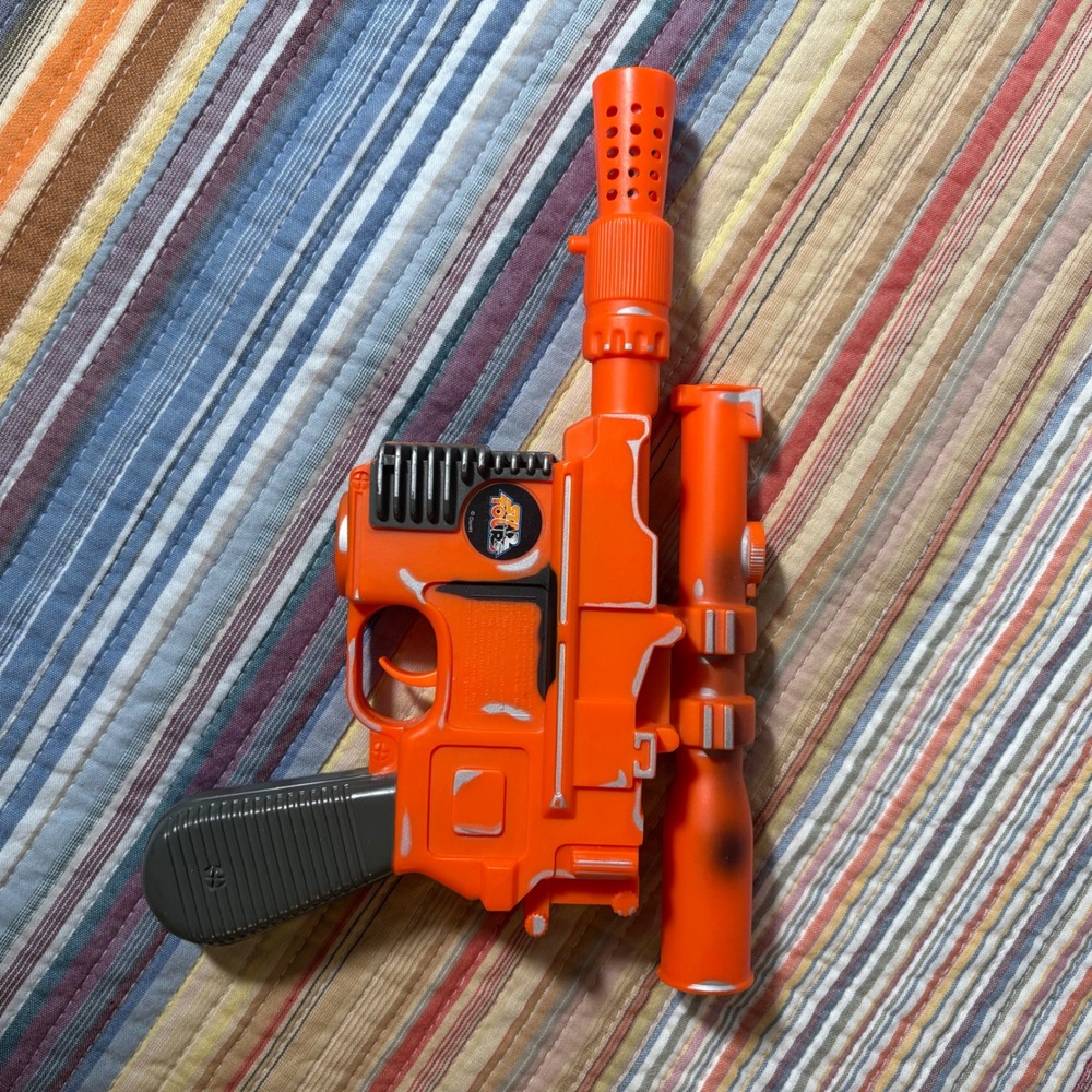 Disney Star Tours Star Wars Han Solo DL-44 Blaster Toy Orange Silver Weathered